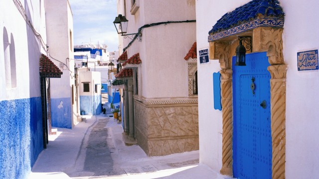 Article thumbnail: Blue and white buildings in Rabat's Kasbah des Oudaias (Photo: Atlantide Phototravel/Getty Images)