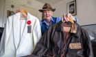 Fife stuntman Bob McCrystal with classic keepsakes from the Indiana Jones films. Image: Kenny Smith.