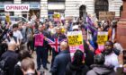 A demonstration in Manchester after an incident involving police at Manchester Airport. Image: James Speakman/PA Wire