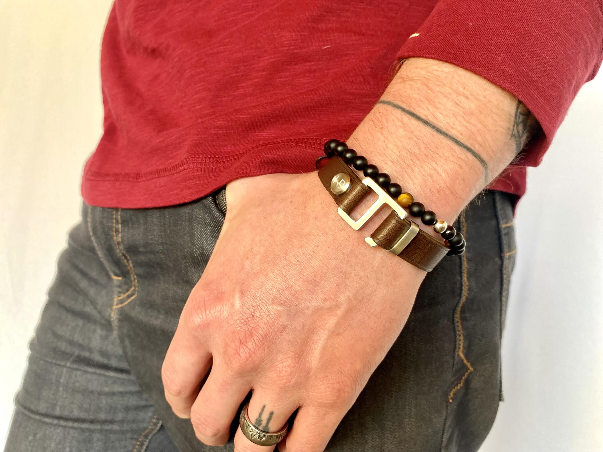 Our striking dark brown Italian leather cuff bracelet is paired perfectly with our artisan designed  hardware. Choice includes brushed rose gold, yellow gold, stainless steel or black ceramic. This adjustable size bracelet is a distinctive piece worn alone or with a WristBend stacking bracelet. Made by WristBend