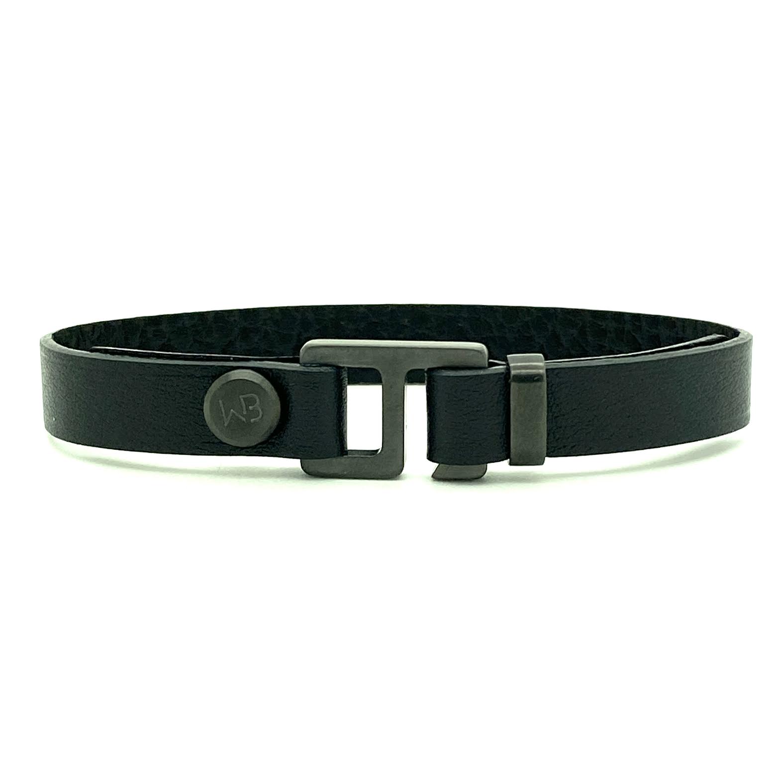 With a trendy, cool modern vibe, this black Italian leather cuff bracelet is paired with your choice of brushed stainless steel, brass or black ceramic hardware. Our signature cuff bracelet is a modern staple for your WristBend collection. Made by WristBend