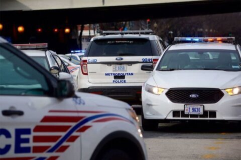 Woman killed inside her car in Northeast DC shooting; 2 suspects sought