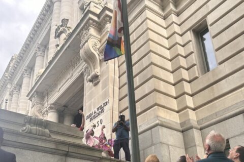 Mayor Bowser kicks off DC pride celebrations with the raising of the rainbow flag