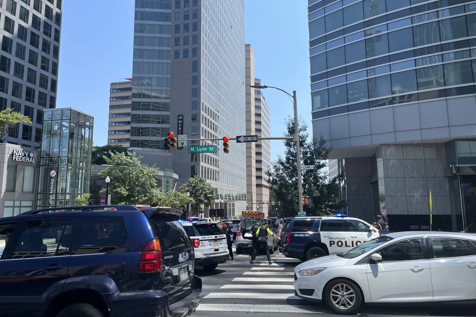 A person suspected of a series of carjackings in the Rosslyn area was wounded in a shooting involving a Metro Transit Police officer, police said Friday. (WTOP/Ana Golden)