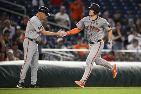 Chapman has 3 hits including a homer, Snell goes 6 innings and Giants beat Nationals 7-4