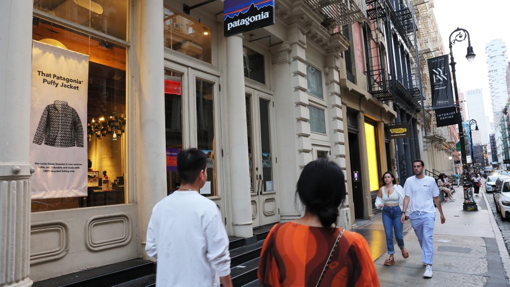 Shoppers on Greene Street near a Patagonia store on Greene Street on September 14, 2022 in New York City. Yvon Chouinard, founder of Patagonia, his spouse and two adult children announced that they will be giving away the ownership of their company which is worth about $3 billion. The company's privately held stock will be now be owned by a climate-focused trust and group of nonprofit organizations, called the Patagonia Purpose Trust and the Holdfast Collective, and all the profits that are not reinvested into the business will be used to fight climate change. (Photo by Michael M. Santiago/Getty Images)