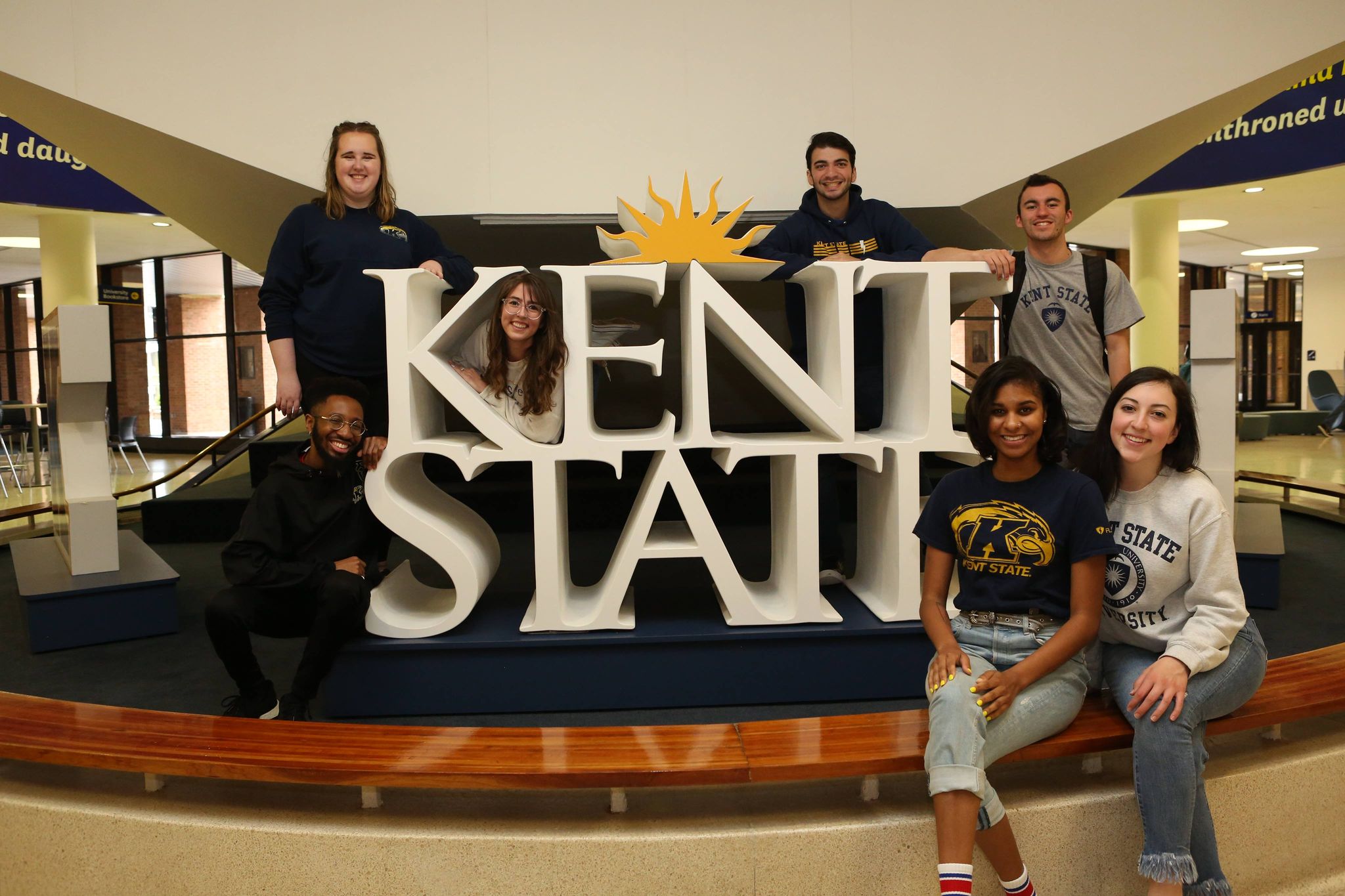 Pooyan and friends posing with Kent State sign