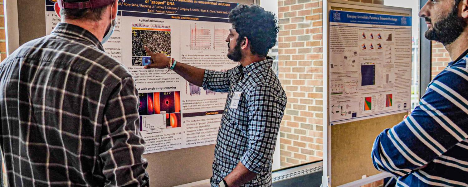 Students presenting research posters at the Research Symposium