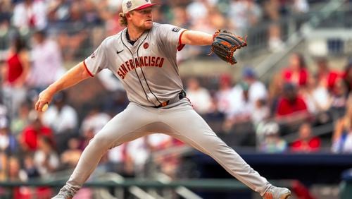 San Francisco Giants pitcher Logan Webb throws during the first inning of a baseball game against the Atlanta Braves, Thursday, July 4, 2024, in Atlanta. (AP Photo/Jason Allen)