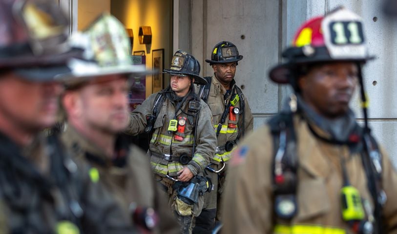 Atlanta firefighters responded to the report of a High-rise fire Tuesday morning, June 25, 2024 at Twelve Atlantic Station Condos Atlanta located at 361 17th Street. With outside temperatures already on the rise firefighters ascended multiple stories of the High-rise with heavy equipment only to find no sign of fire.  (John Spink/AJC)
