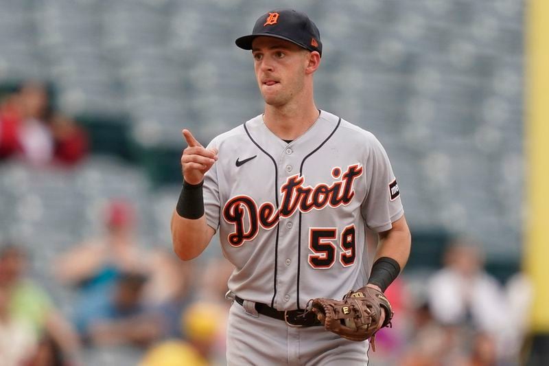 Detroit Tigers shortstop Zack Short celebrates after catching a line hit by Los Angeles Angels' Zach Neto to seal the team's 5-3 win, Sunday, Sept. 17, 2023, in Anaheim, Calif. (AP Photo/Ryan Sun)