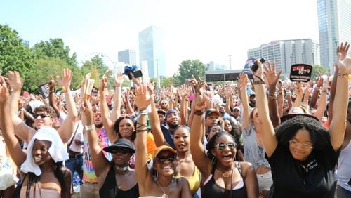 Concert-goers cheer during performances at One Music Fest. (Tyson Horne-tyson.horne@ajc.com)