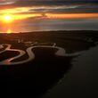 The early morning sun breaks through the clouds over Ossabaw Island, Ga., on Friday, Nov. 17, 2006. CURTIS COMPTON / THE ATLANTA JOURNAL-CONSTITUTION