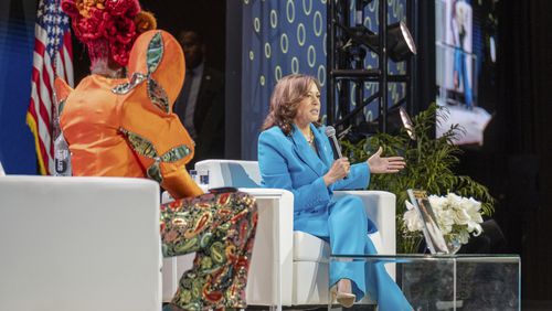 Vice President Kamala Harris, right, speaks with Essence CEO Caroline Wanga during the 30th annual Essence Festival of Culture in New Orleans, Saturday, July 6, 2024. (Matthew Perschall/The Times-Picayune/The New Orleans Advocate via AP)