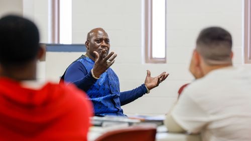 George Simmons speaks to a group of inmates going through a Washington County Jail diversion program that aims to teach them skills to keep them from offending again. Simmons, who served 10 years in a federal prison for a drug conviction, now helps inmates return to society, speaking about how to find jobs and restore their rights. (Miguel Martinez / AJC)