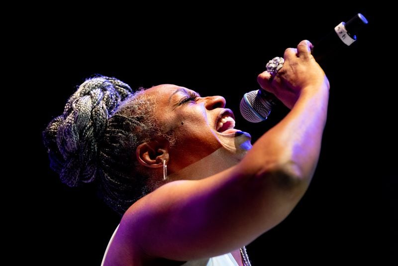 Singer Regina Belle performs on stage. The Stockbridge Amphitheater was host to the Karen Briggs Contempo Orchestra on Saturday, July 6, 2024. (Ben Hendren for the Atlanta Journal-Constitution)