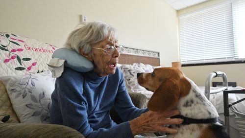 July 14, 2021 Smyrna - Rita Manatrizio plays with therapy dog Bella at her room at Woodland Ridge Assisted Living on Wednesday, July 14, 2021. (Hyosub Shin / Hyosub.Shin@ajc.com)