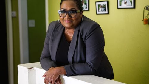 Ophelia Nnorom of Clayton County said that she sees both Joe Biden and Donald Trump more positively after watching the presidential candidates debate. She still wants to know more about their stances on education, though. “A lot can happen between now and November,” she said. (Natrice Miller/ AJC)