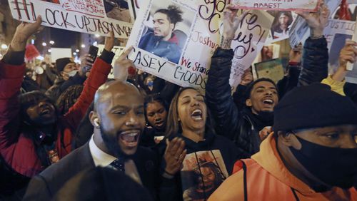 FILE - Tamala Payne, center, and attorney Sean Walton participate in a protest march Dec. 11, 2020, in Columbus, Ohio, for Payne's son, Casey Goodson Jr., who was shot and killed by Franklin County deputy sheriff Jason Meade. (Doral Chenoweth/The Columbus Dispatch via AP, File)