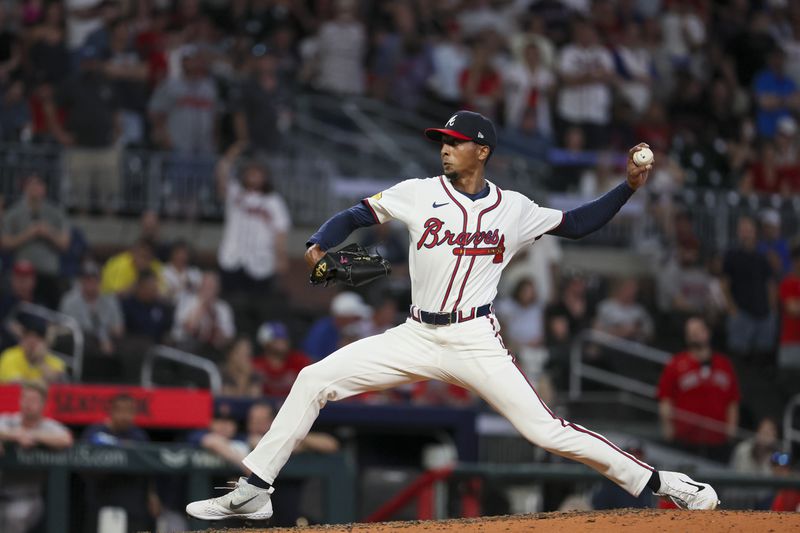 Atlanta Braves pitcher Ray Kerr (58) delivers to a Boston Red Sox batter during the ninth inning at Truist Park, Wednesday, May 8, 2024, in Atlanta. Braves won 5-0. (Jason Getz / AJC)
