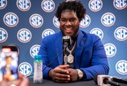 Alabama offensive lineman speaks during the Southeastern Conference NCAA college football media days Wednesday, July 17, 2024, in Dallas. (AP Photo/Jeffrey McWhorter)