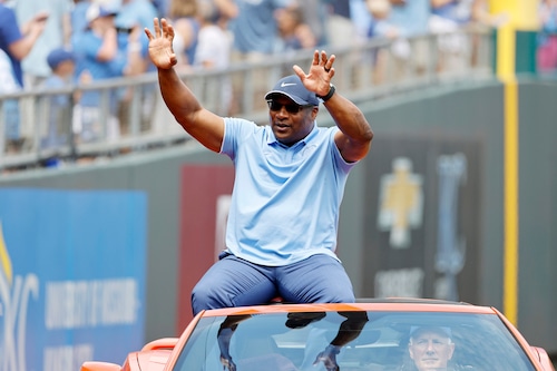 Bo Jackson waves to the crowd as he enters Kauffman Stadium for his induction into the Kansas City Royals Hall of Fame