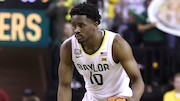 Baylor guard Adam Flagler (10) takes the ball up court during an NCAA college basketball game against Iowa State Saturday, March 4, 2023, in Waco, Texas. (AP Photo/Jerry Larson)