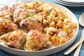 a plate of greek lemon chicken and potatoes 