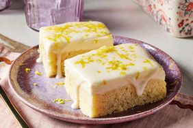 Lemon Fluffy Cake sitting on a purple plate