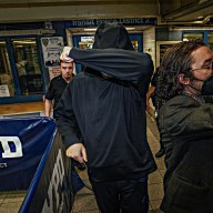 Pro-Palestine protester who made Zionist threat shields himself after turning self in.