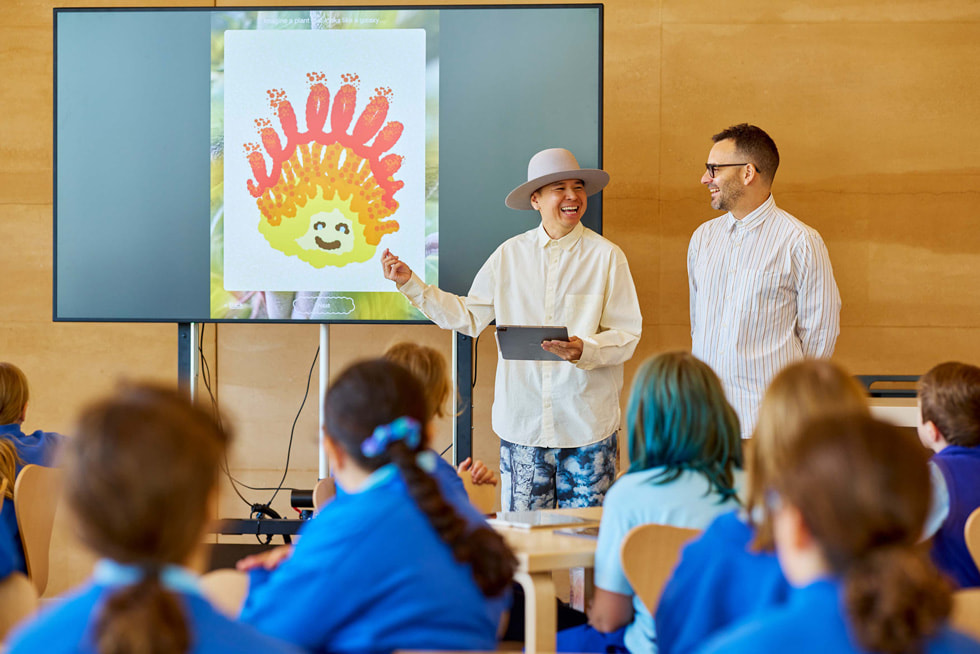 Tin Nguyen and Edward Cutting of Tin&Ed deliver a presentation to a group of young artists.