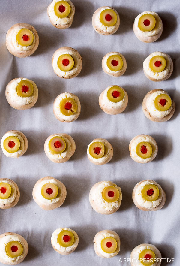 How to Make 5-ingredient Stuffed Mushroom Eyeballs for Halloween on ASpicyPerspective.com 