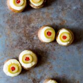 So much fun! Spooky 5-ingredient Stuffed Mushroom Eyeballs for Halloween on ASpicyPerspective.com