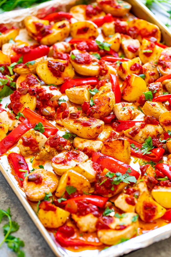 baked salsa chicken and potatoes on a sheet pan