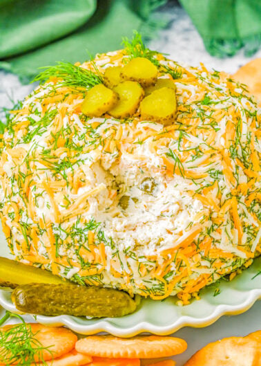 Dill Pickle Cheese Ball - Calling all dill pickle fans, this super EASY appetizer recipe is creamy, cheesy and chock full of dill pickles, dill pickle relish, and plenty of fresh dill! When you're looking for a fan FAVORITE recipe to serve at your next holiday party or event, backyard barbecue, picnic, or potluck, put this quick and simple recipe on the list!