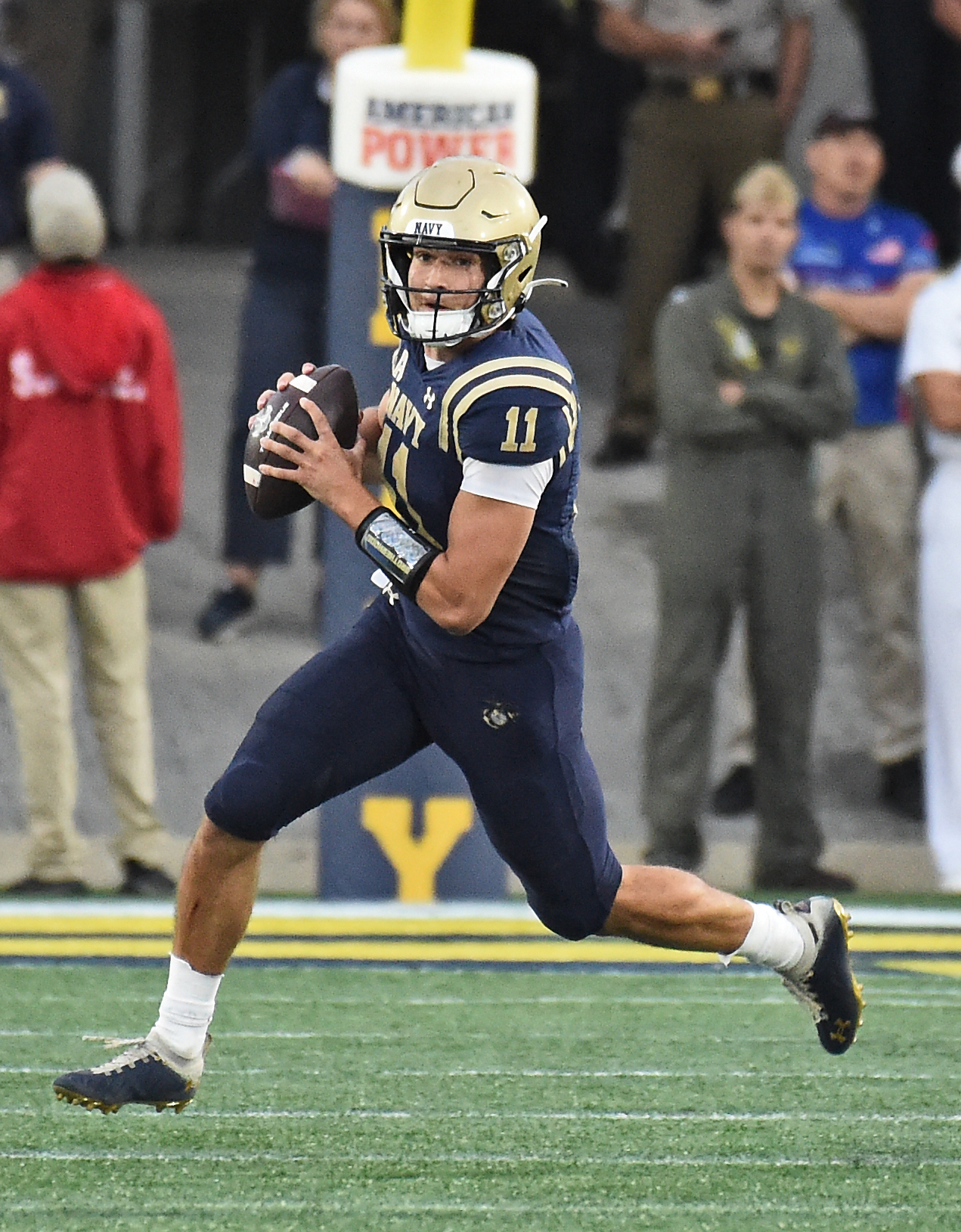 Navy quarterback Blake Horvath scrambles in the third quarter. The Navy Midshipmen play the visiting University of South Florida Bulls in NCAA football Saturday, September 30, 2023 at Navy-Marine Corps Memorial Stadium in Annapolis.