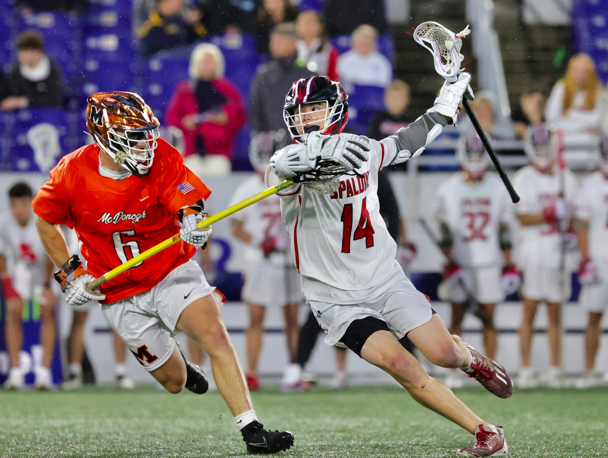 Spalding attackman Joey Matassa dodges against McDonogh defenseman Paul McLucas. (John Malamphy/Courtesy photo)