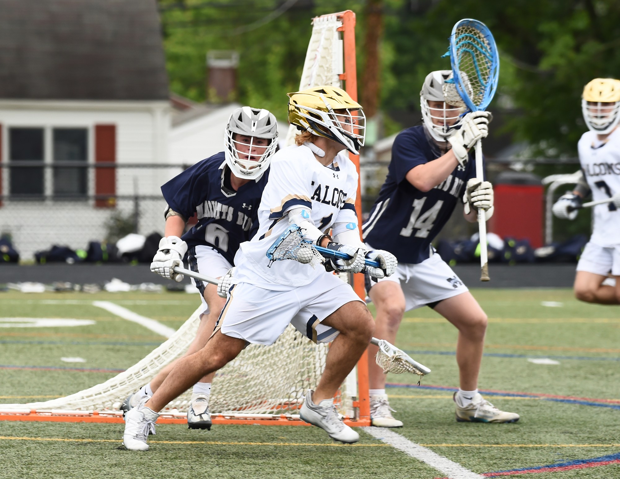 Severna Park's Jack Fish works his way around the net and scores in the first quarter. The Severna Park Falcons defeated the Marriotts Ridge Mustangs, 10-7, in a MPSSAA 3A boys lacrosse semifinal at Glen Burnie High School. (Paul W. Gillespie/Staff photo)
