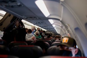 The most efficient way to disembark an airplane tends to conflict with what most travelers consider to be most polite.