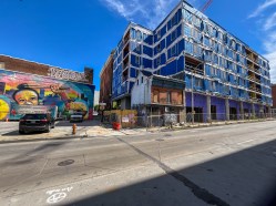 This summer a new apartment building has risen around the successfully preserved but as yet unrestored bar and restaurant Martick's that was once a bohemian hang out for artists and members of the LGBTQ+ community.