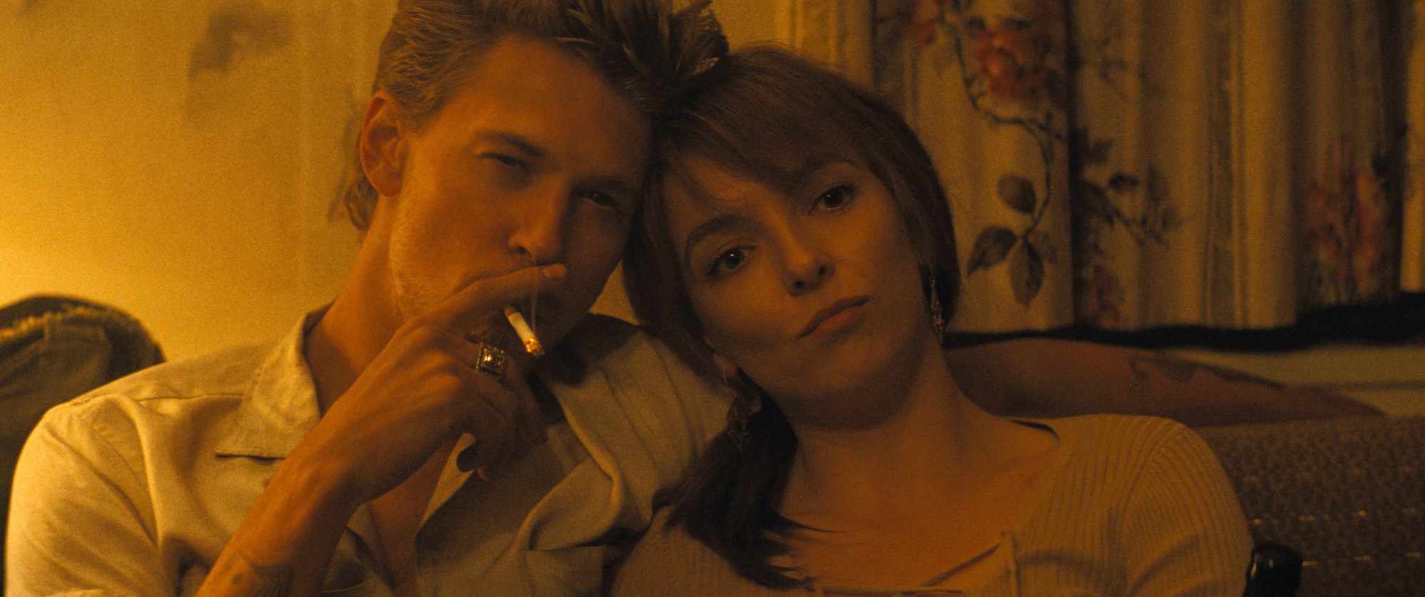 Austin Butler, as Benny, and Jodie Comer, as Kathy, share a scene in "The Bikeriders." (Courtesy of Focus Features)