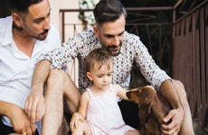 Family with child and dog