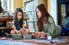 Mother and daughter playing