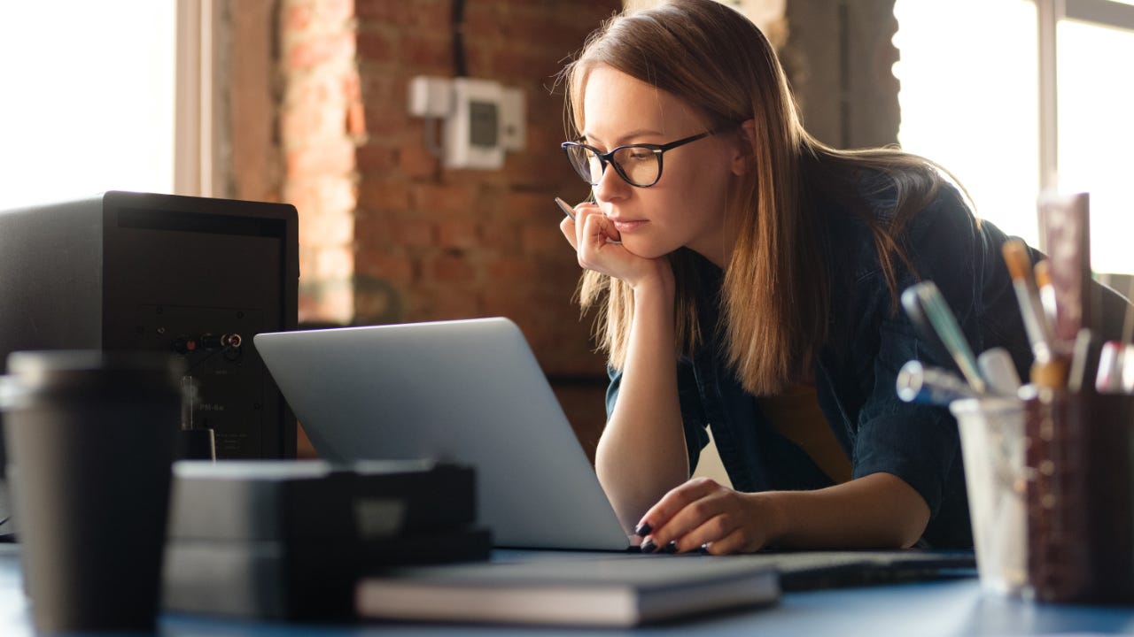 Person looking at laptop