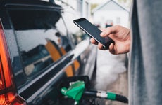 Person pumping gas