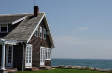 Cedar shingle house on the water in Cape Cod.