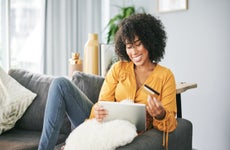 Person looking at tablet and computer