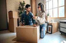 Couple with moving boxes