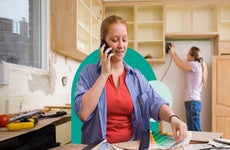 Illustrated collage featuring a woman reviewing paint color swatches inside of a kitchen