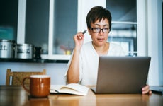 woman working on laptop at home